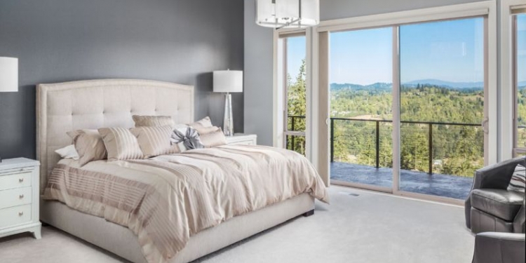 50557090 - master bedroom in luxury home with beautiful view